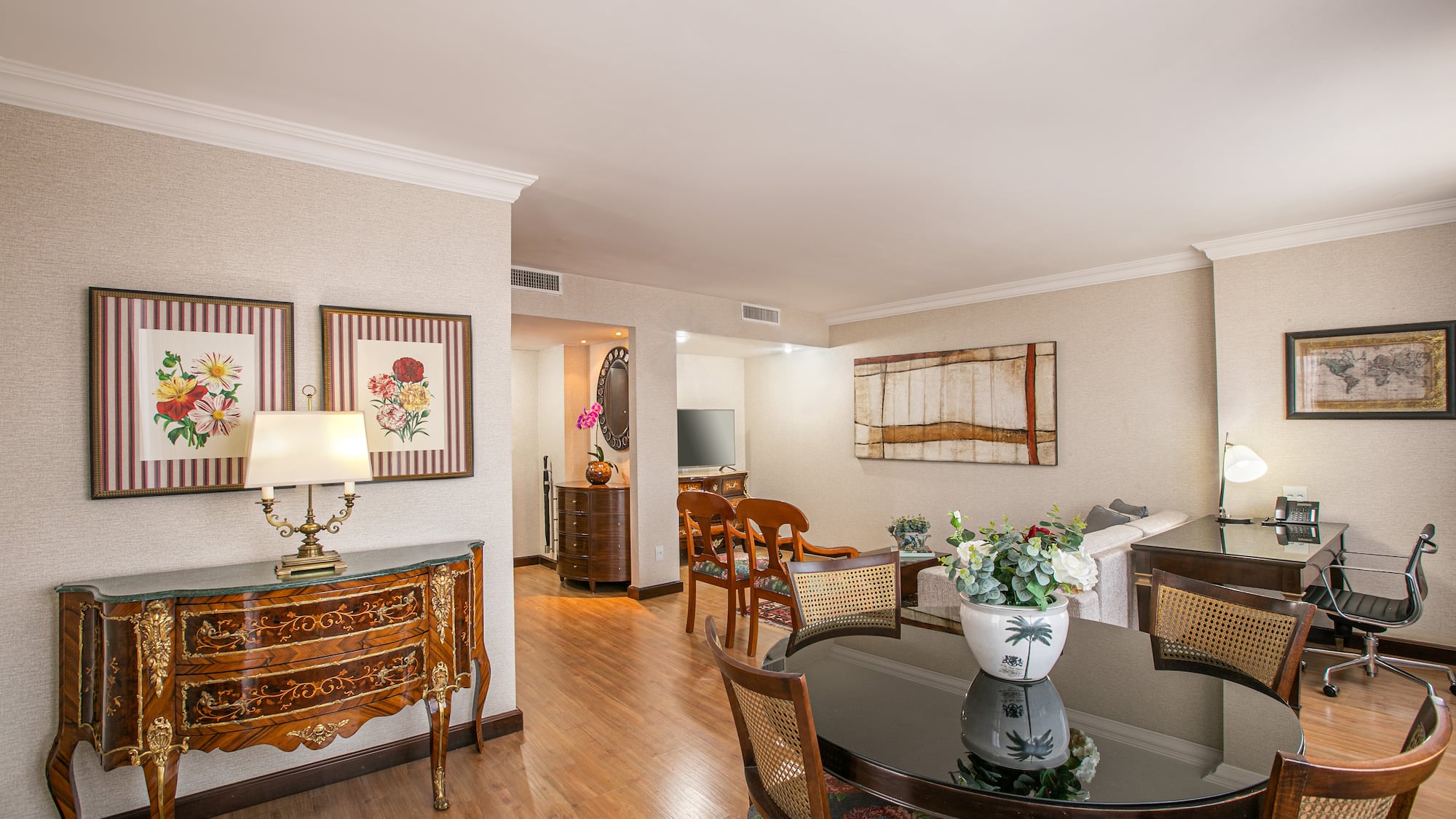 a room with a table and chairs