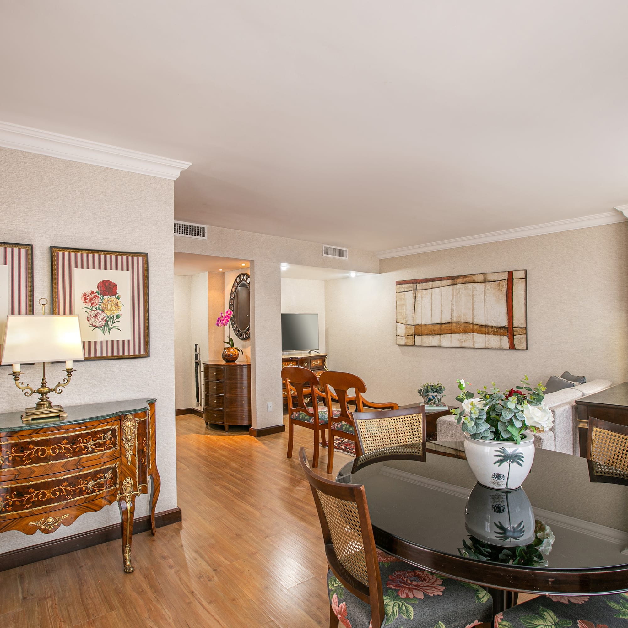 a room with a table and chairs