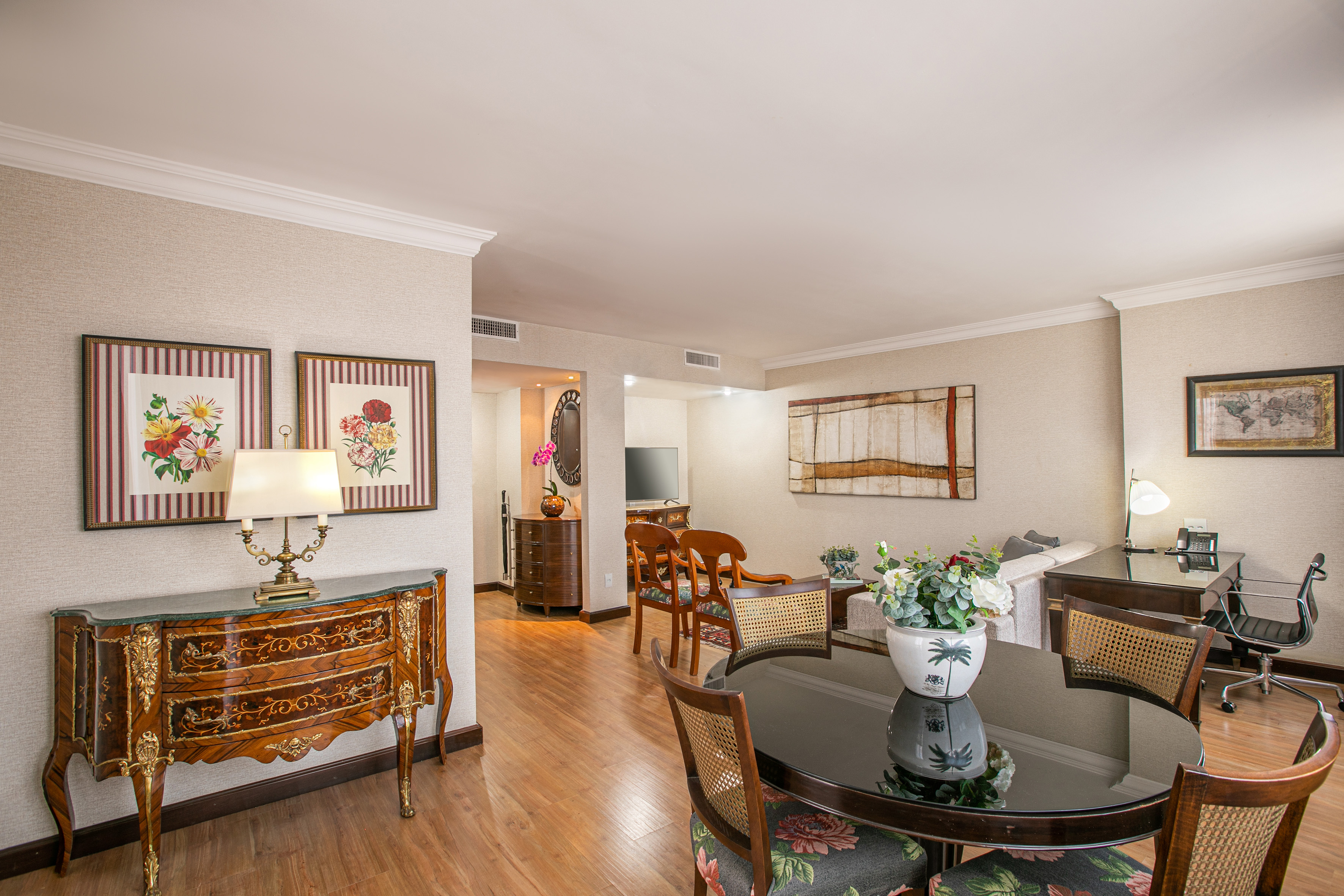 a room with a table and chairs