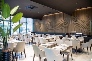 a room with tables and chairs