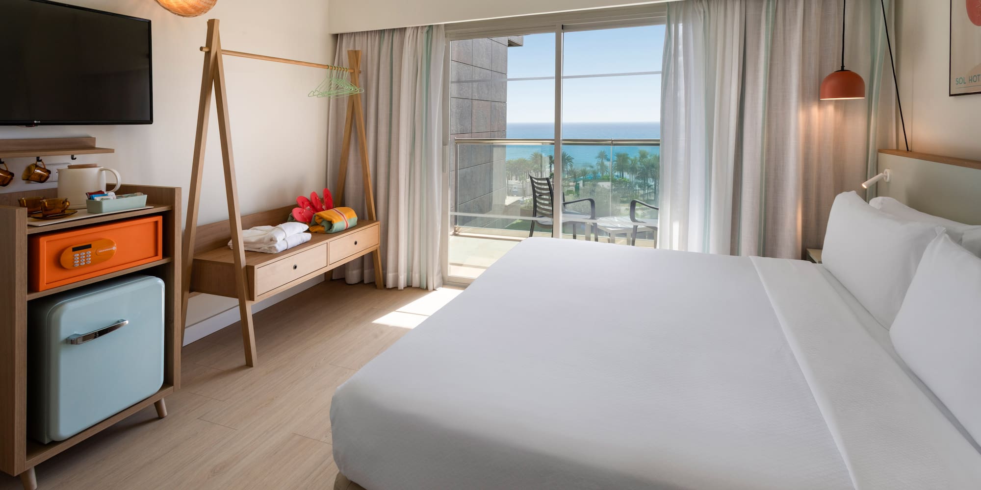 a room with a bed and a window