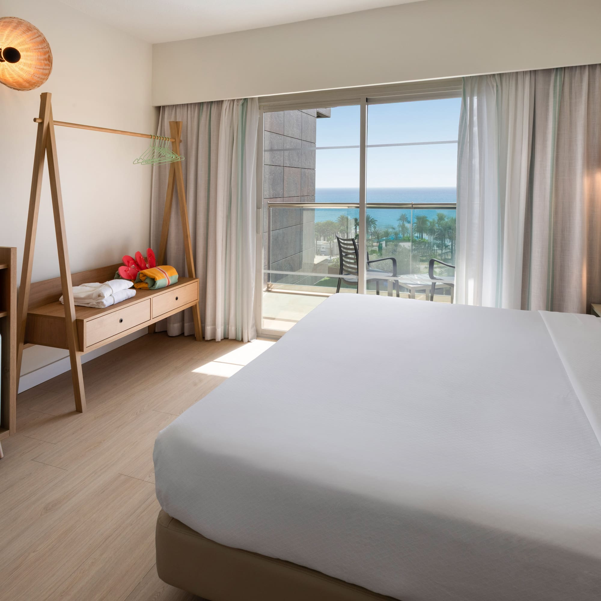 a room with a bed and a window