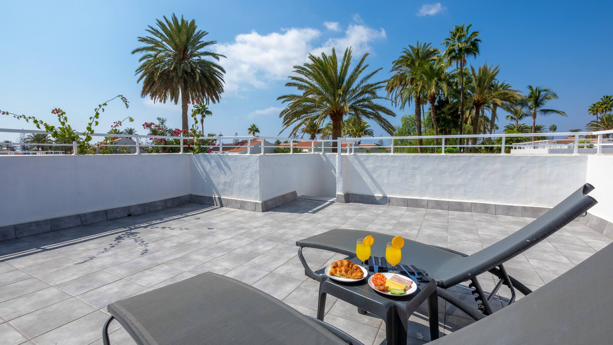 a table with food on it on a patio