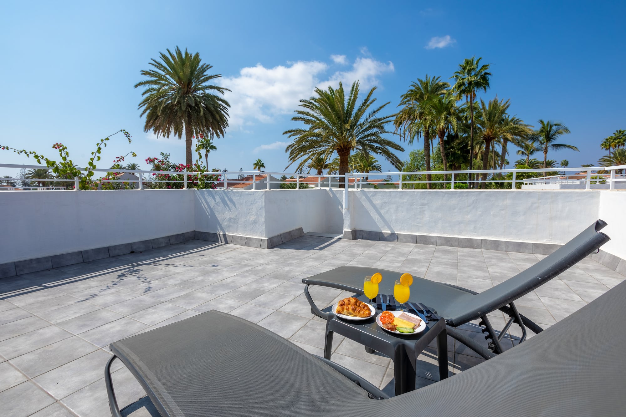 a table with food on it on a patio