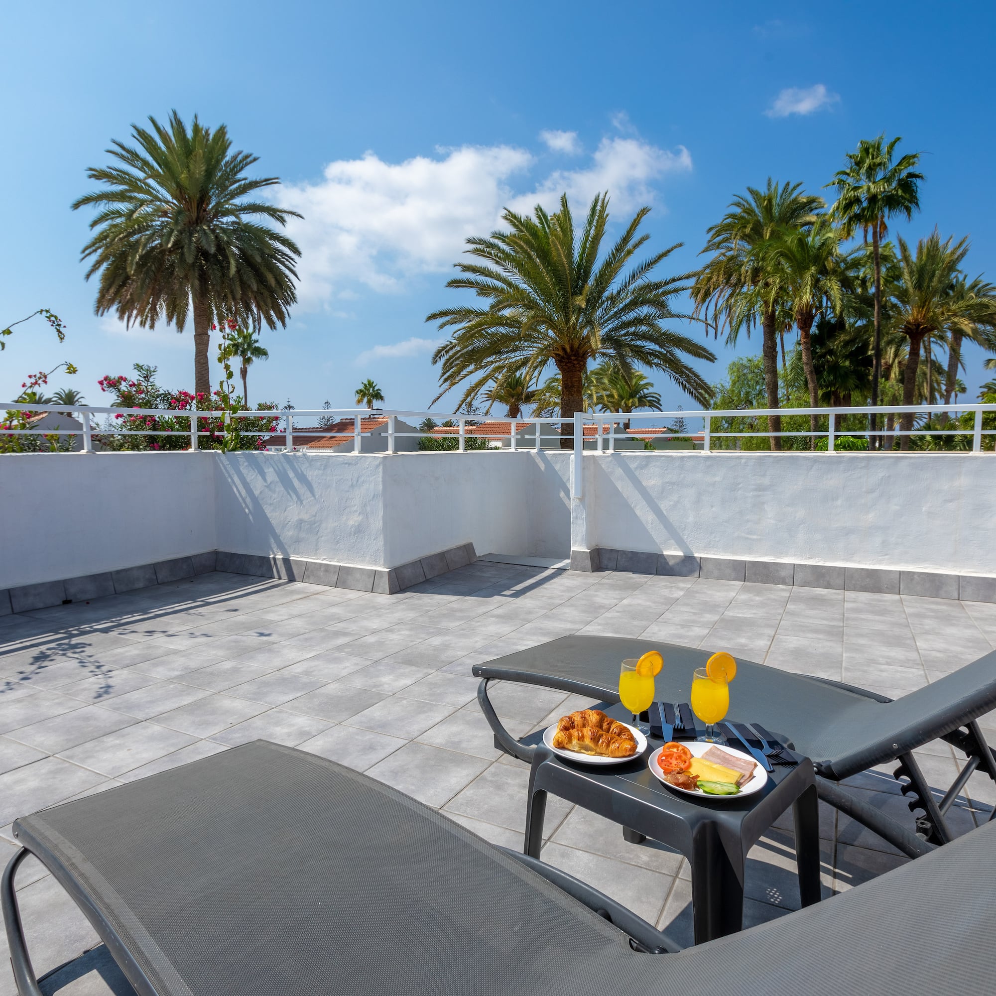 a table with food on it on a patio