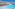Rooftop swimming pool with lounge chairs, parasols, and ocean view.