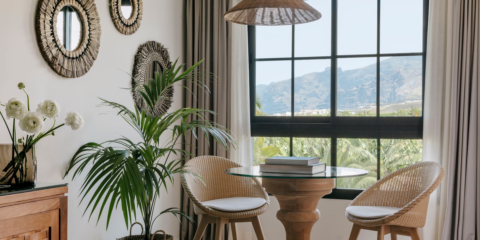 a room with a table and chairs