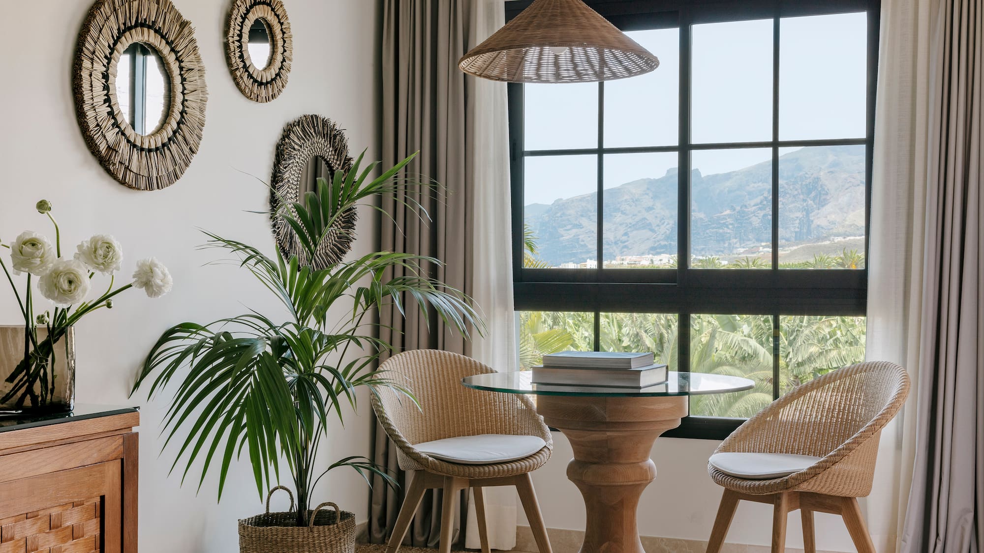 a room with a table and chairs