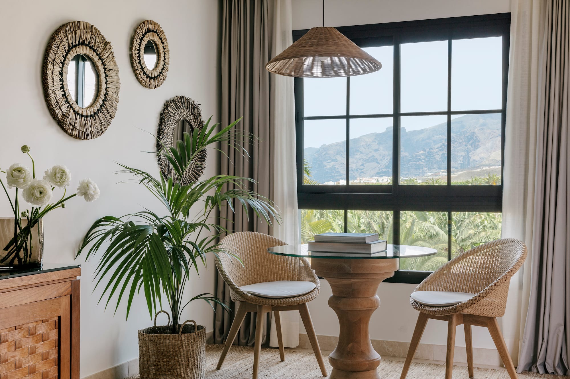 a room with a table and chairs