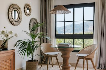 a room with a table and chairs