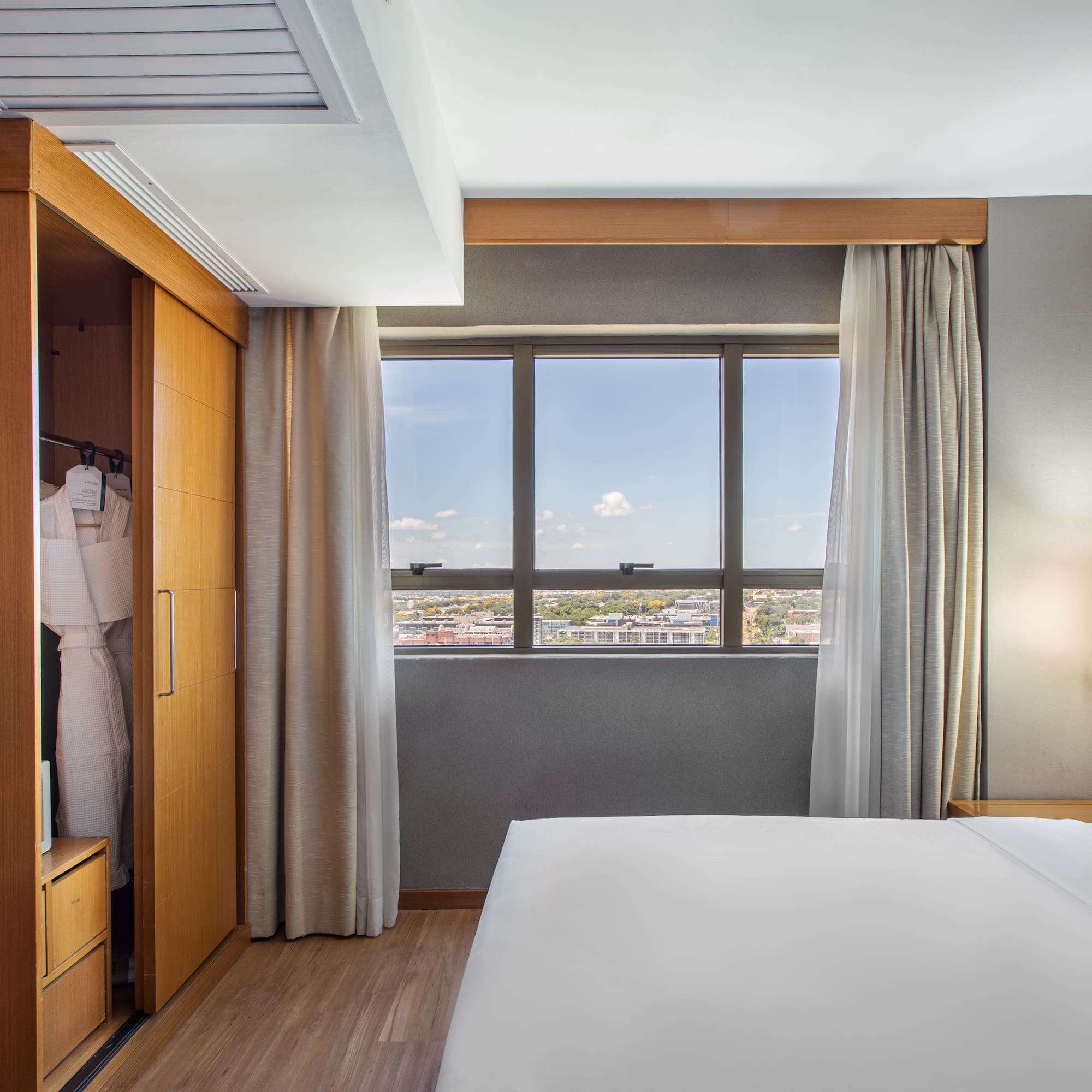 a room with a bed and a closet