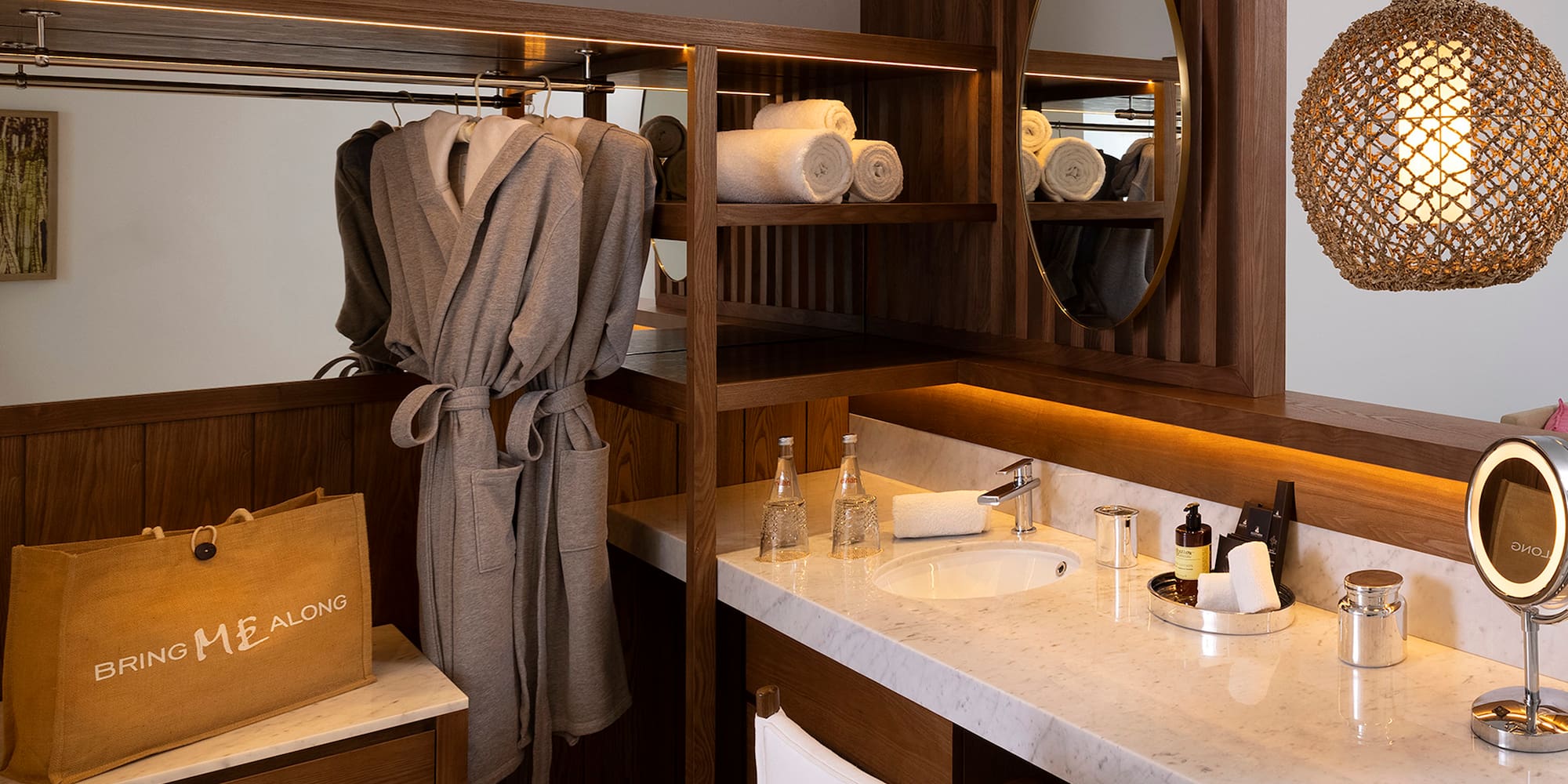 a bathroom with a mirror and towels