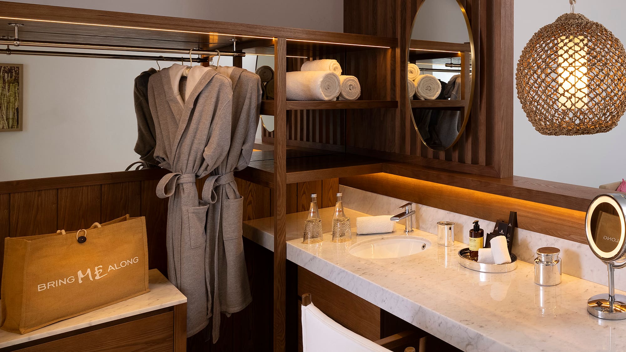 a bathroom with a mirror and towels