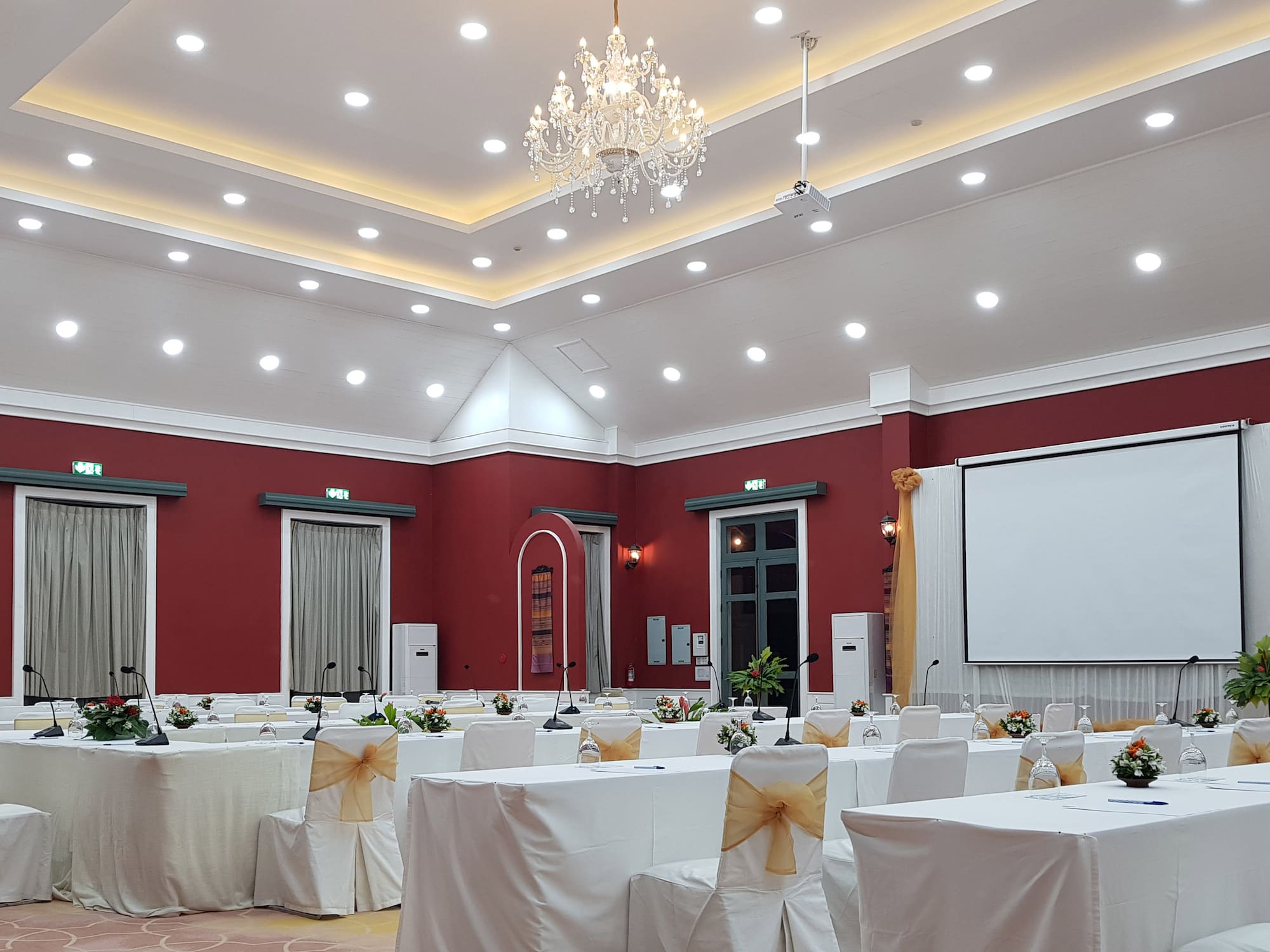 a room with tables and chairs