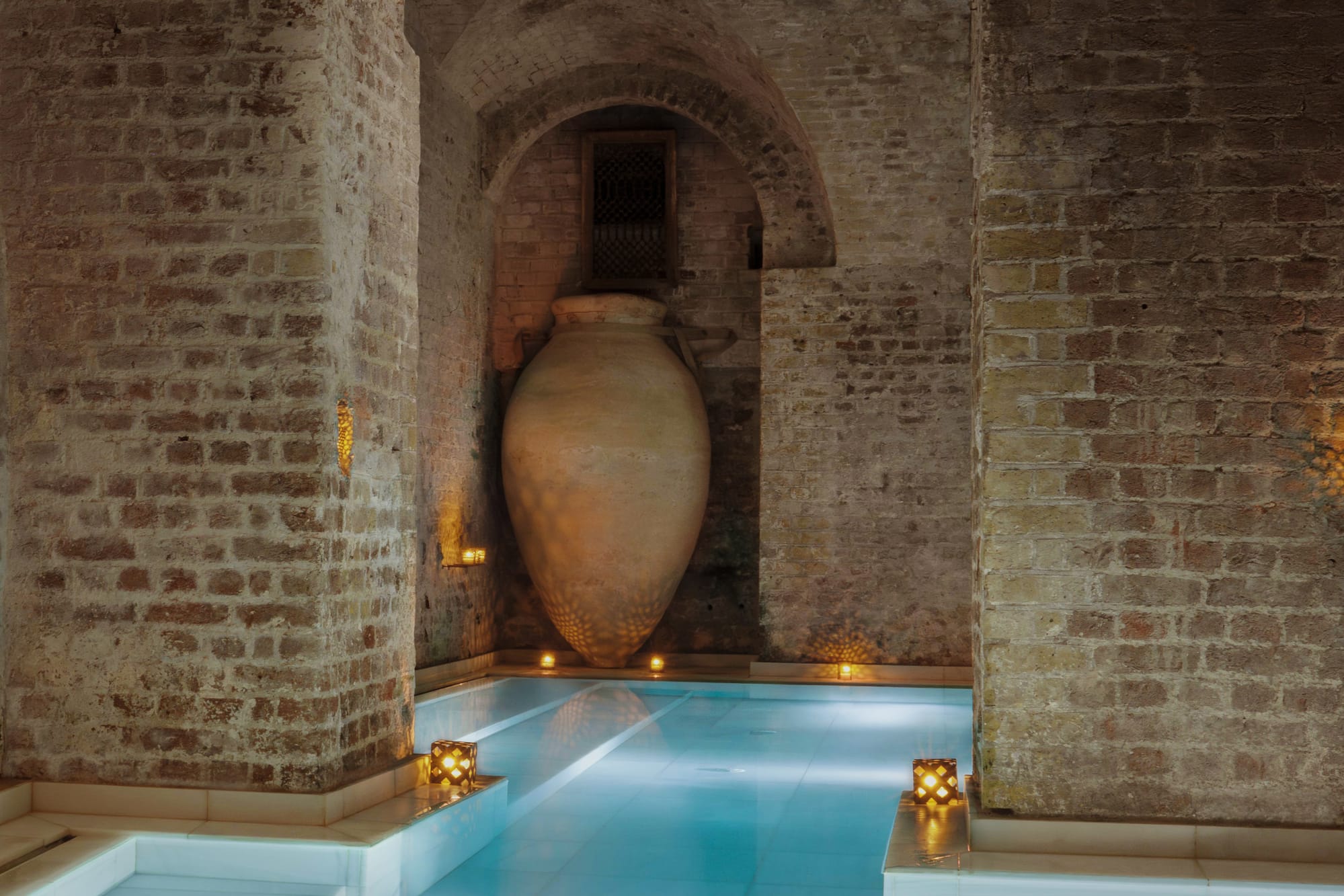 a large pot in a pool