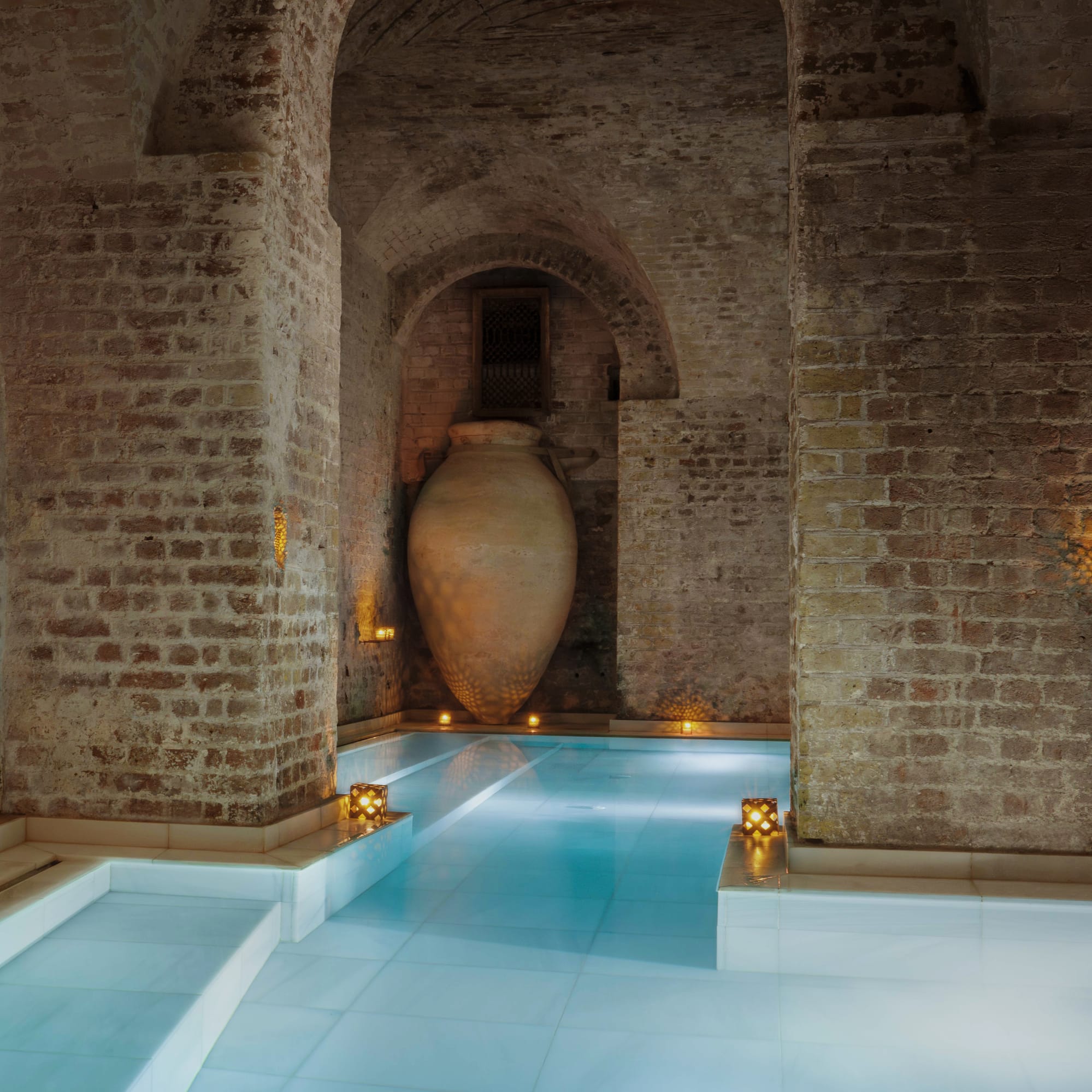 a large pot in a pool