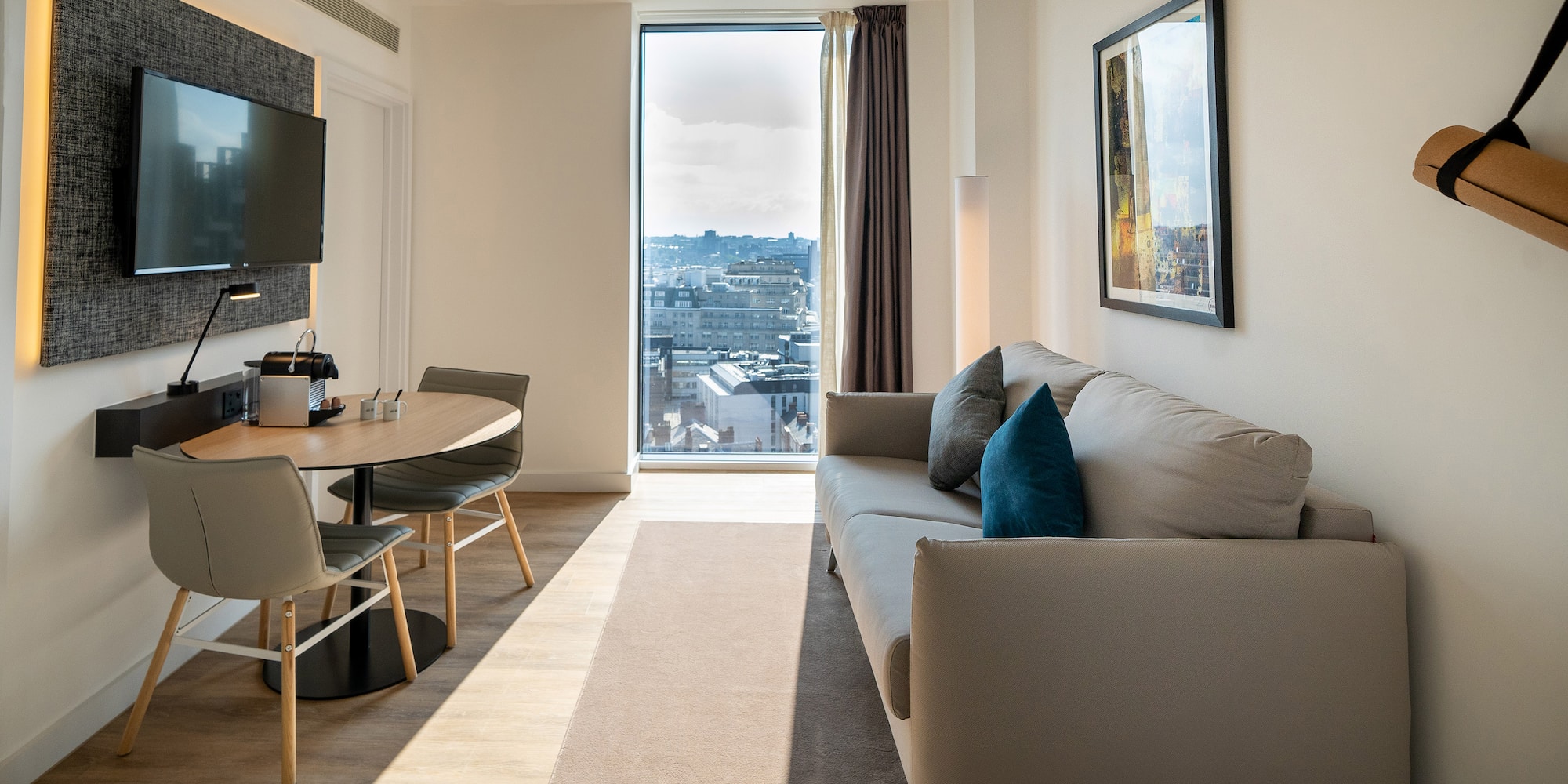 a living room with a couch and table