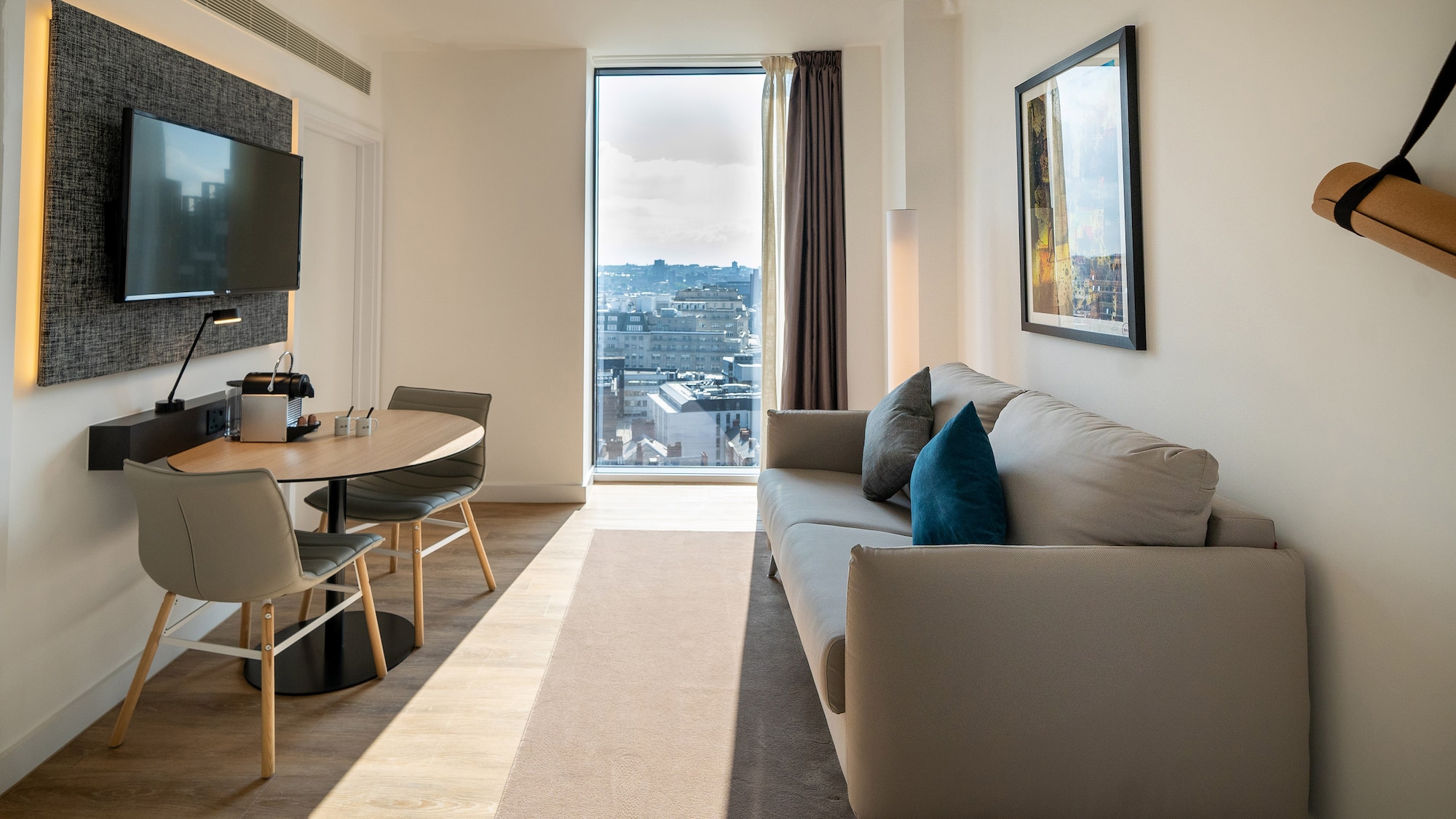 a living room with a couch and table