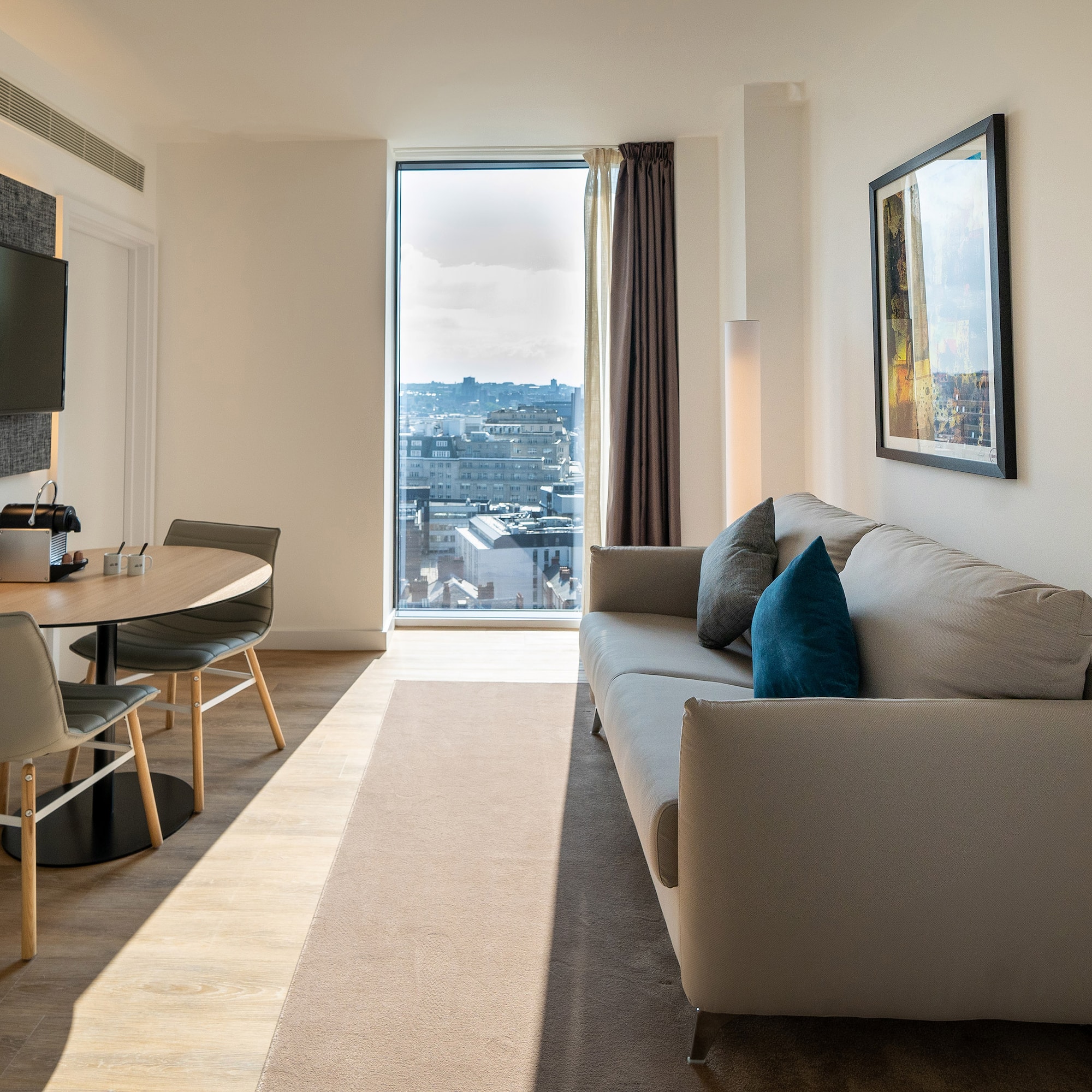 a living room with a couch and table