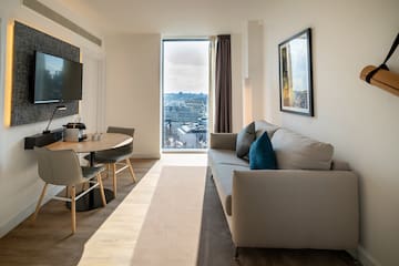 a living room with a couch and table
