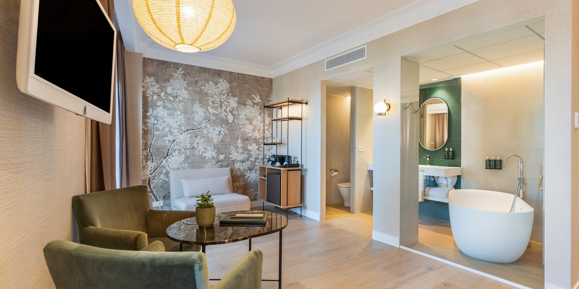 a room with a tub and a tub and a chair