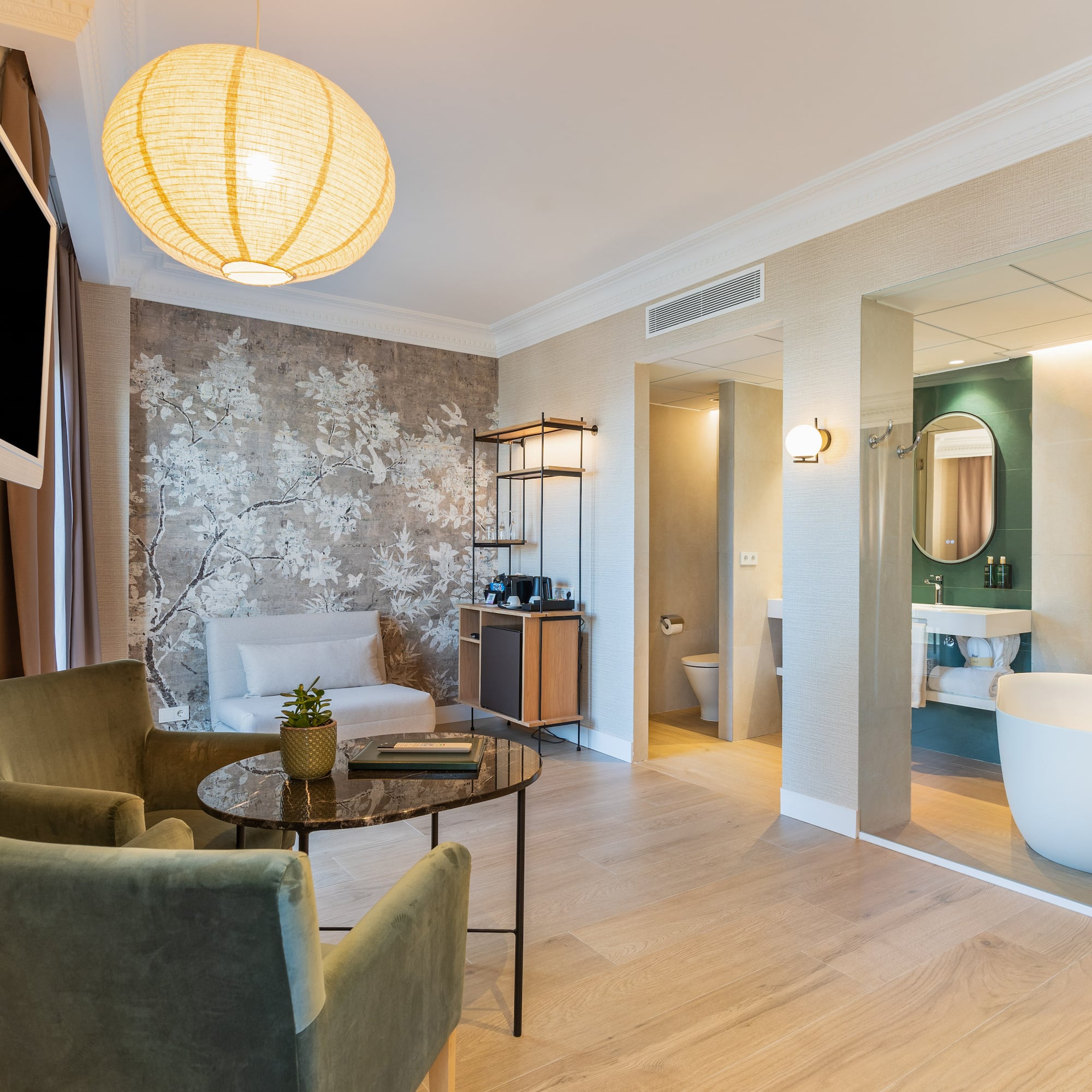 a room with a tub and a tub and a chair