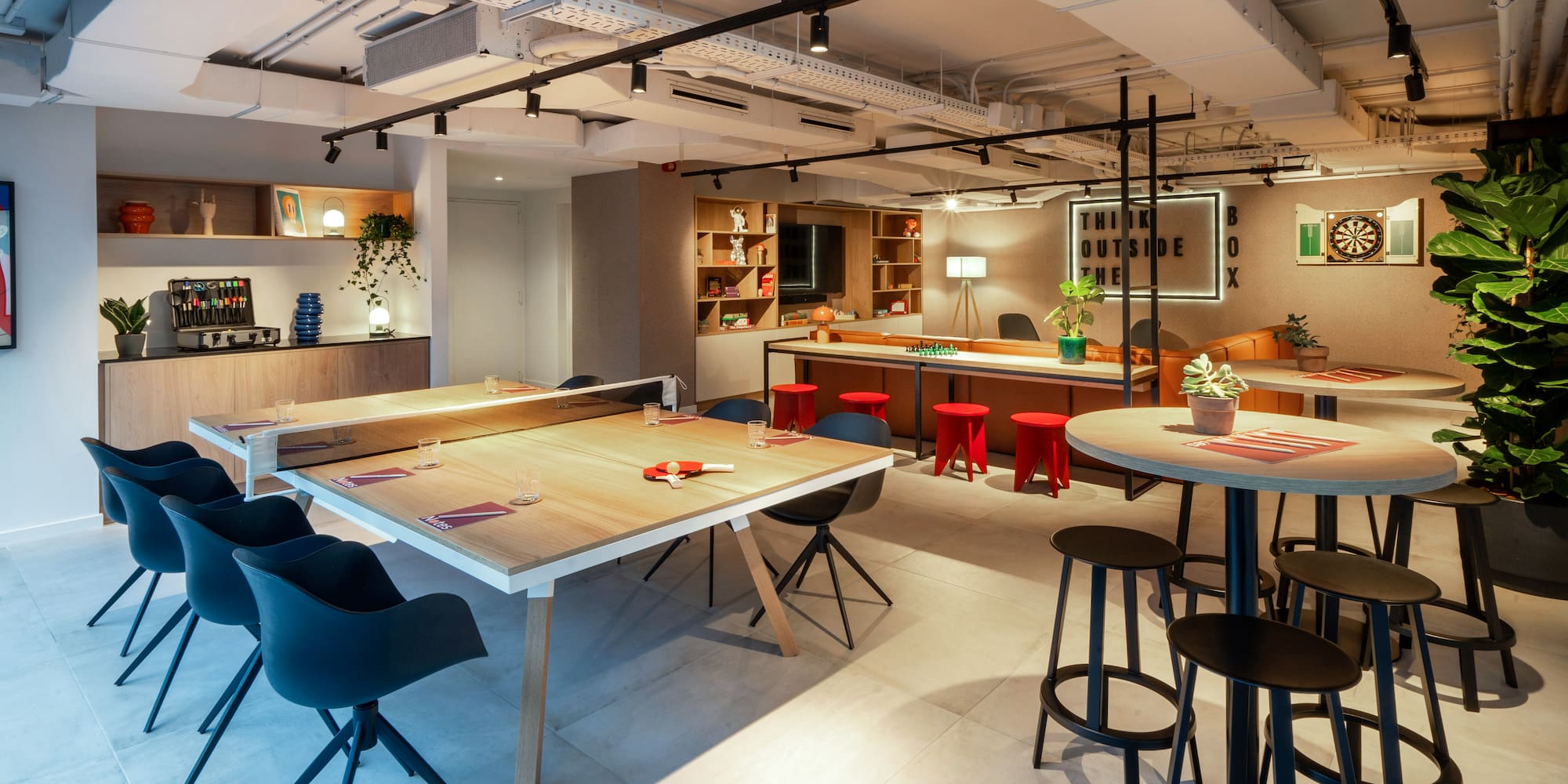 a room with tables and chairs