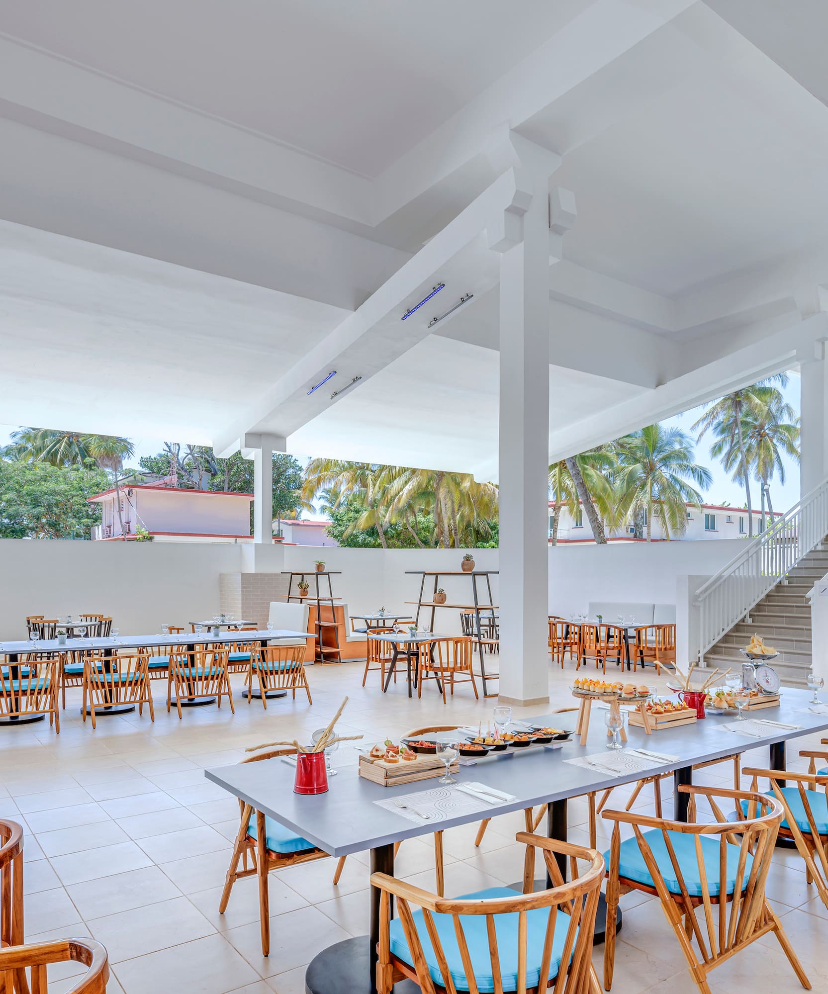 a large room with tables and chairs