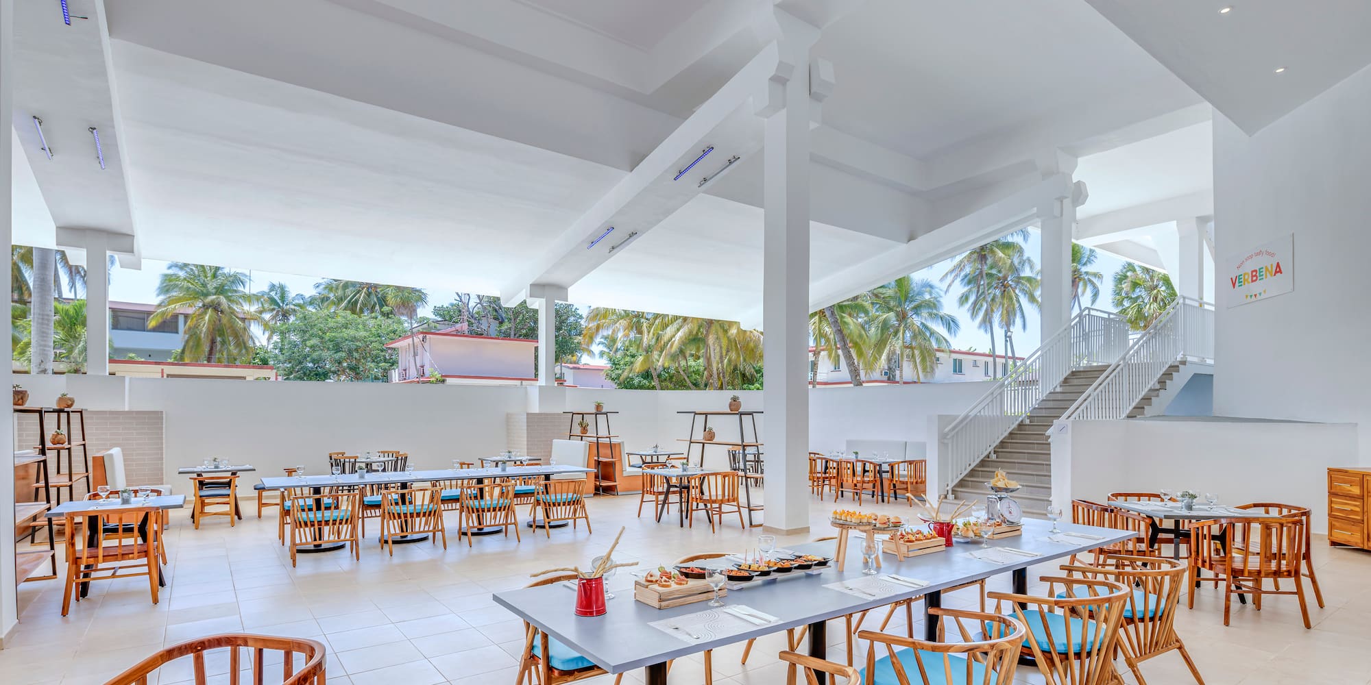 a large room with tables and chairs