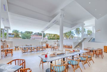 a large room with tables and chairs