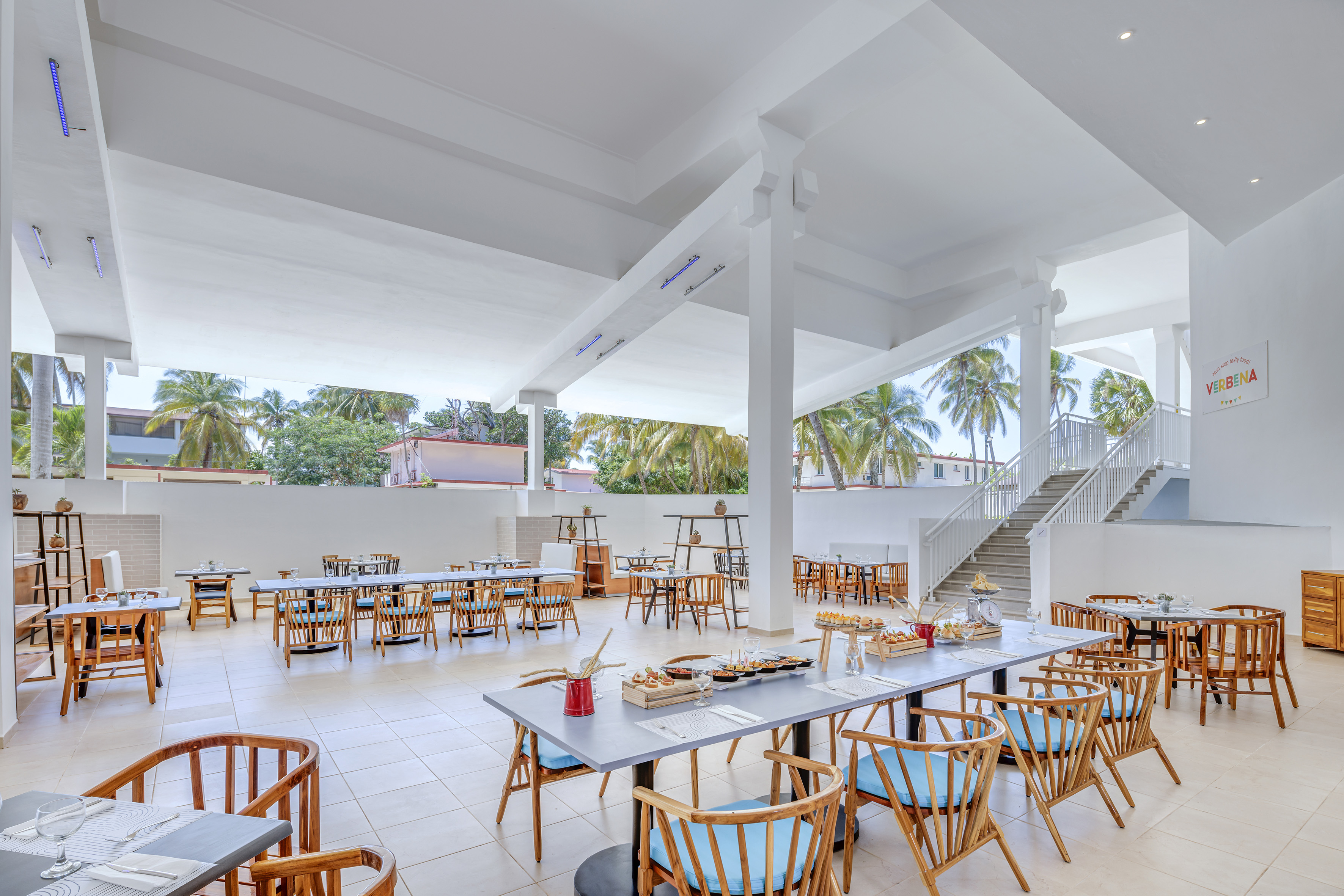 a large room with tables and chairs