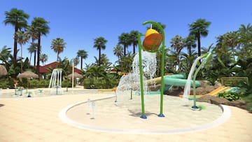 water park with water slides and trees