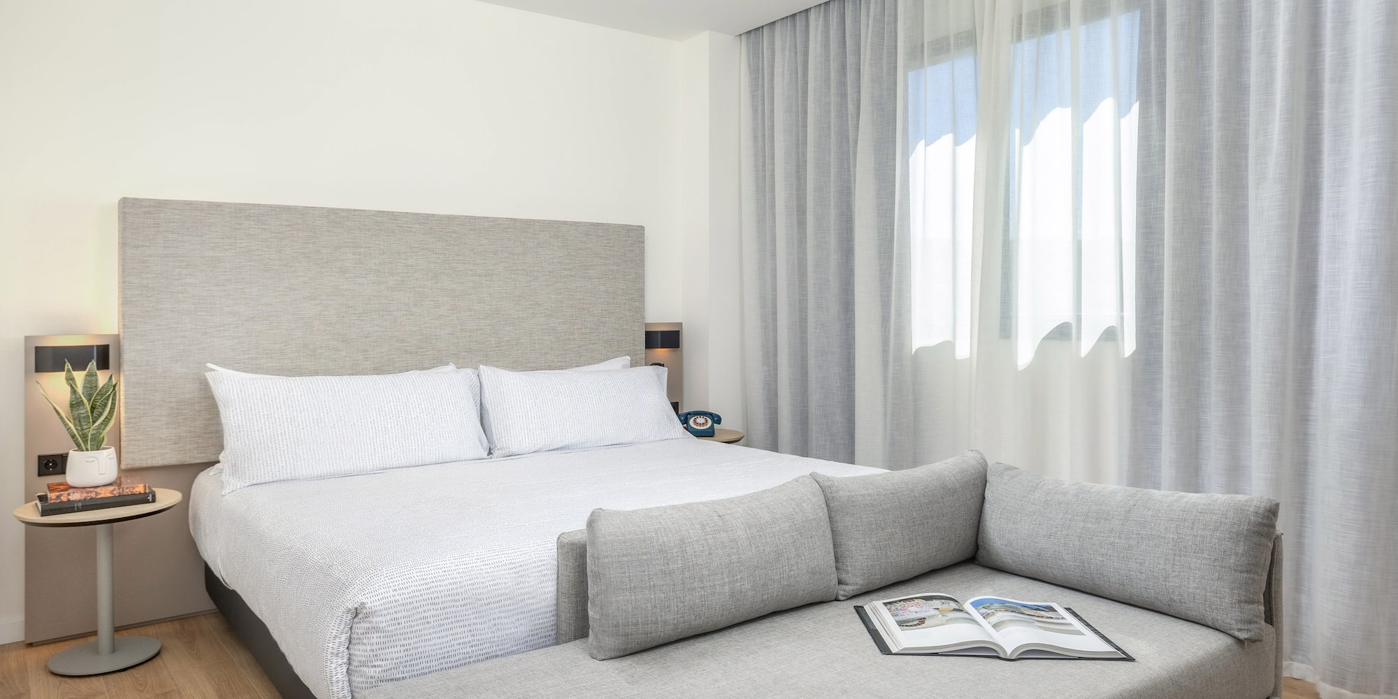 a bed and a couch in a room