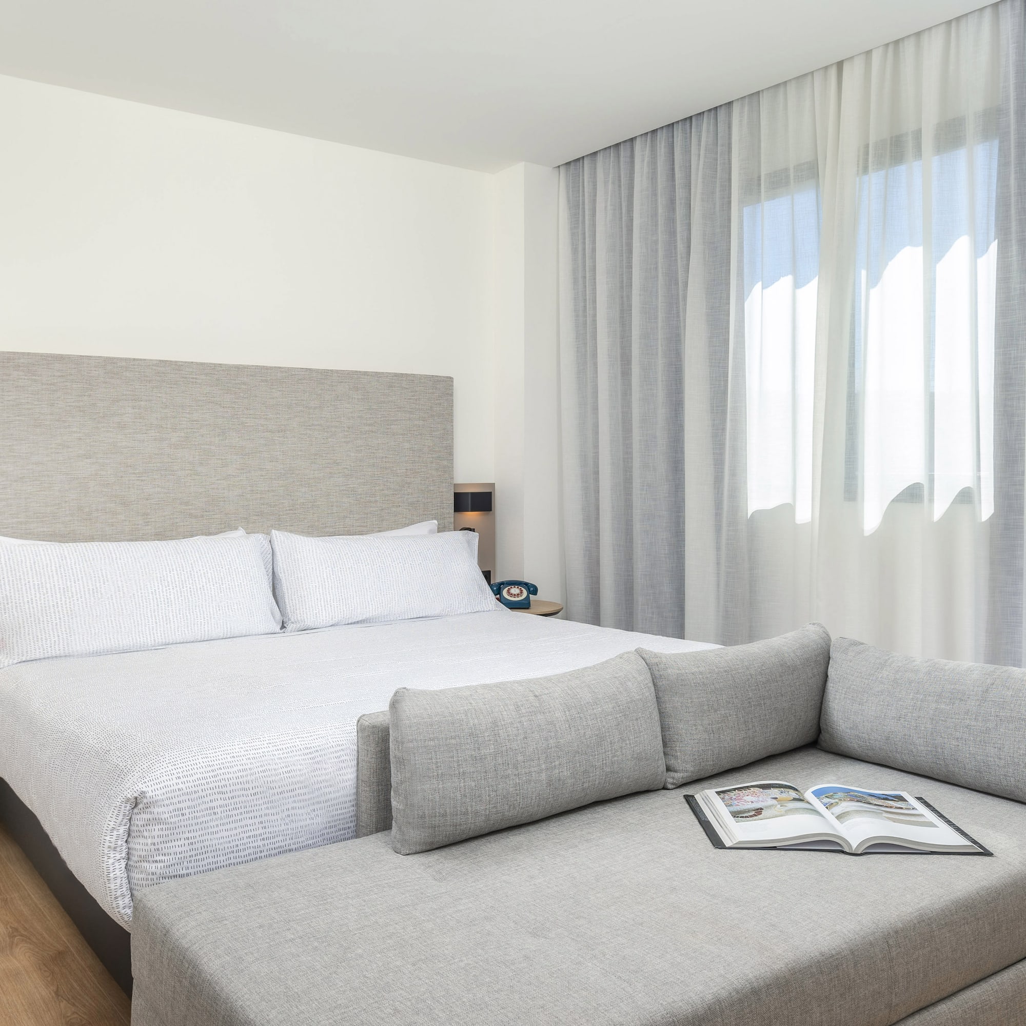 a bed and a couch in a room