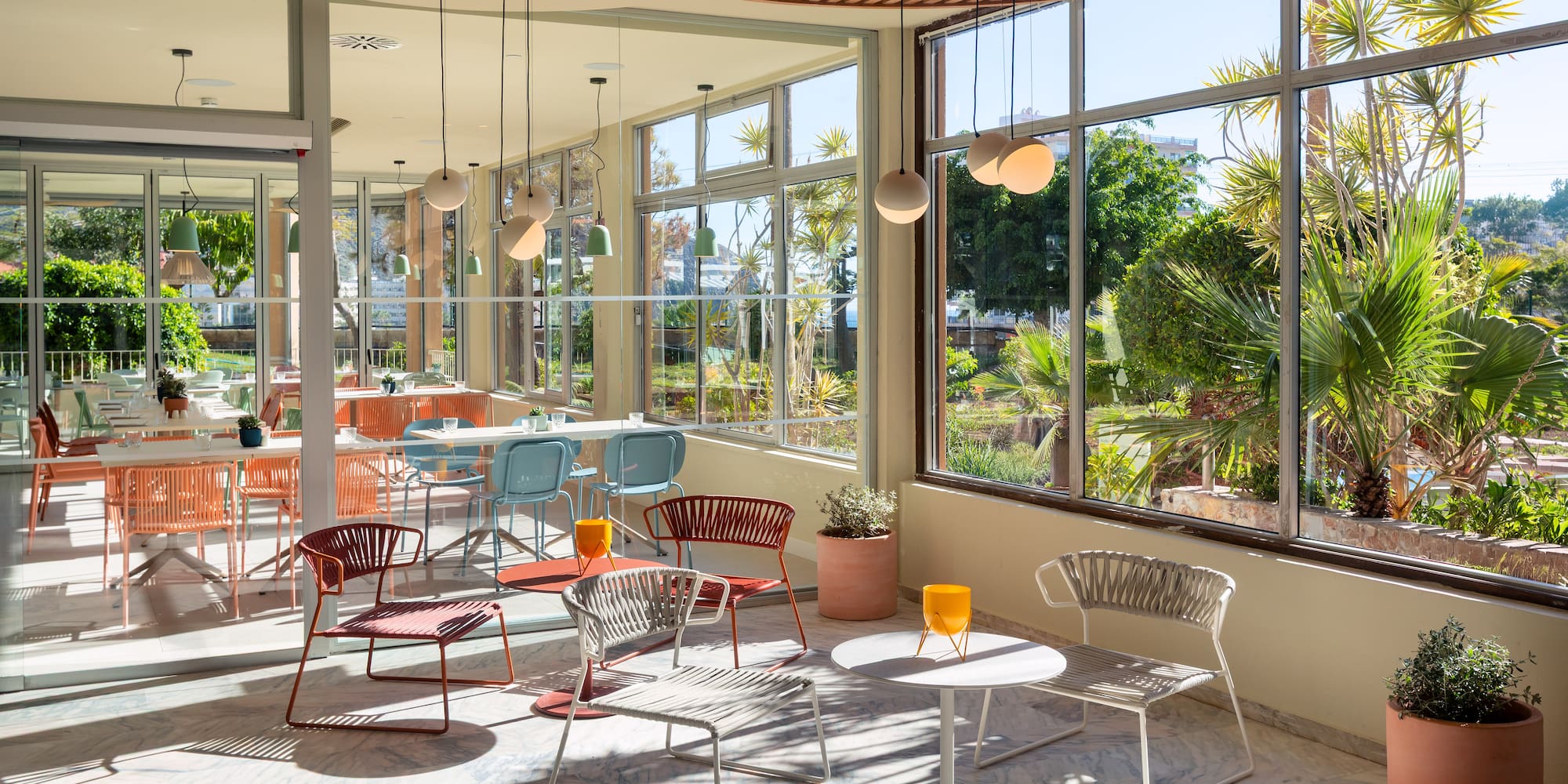 a room with tables and chairs