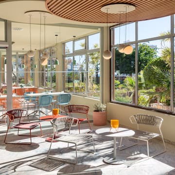 a room with tables and chairs