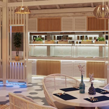 a room with a table and chairs