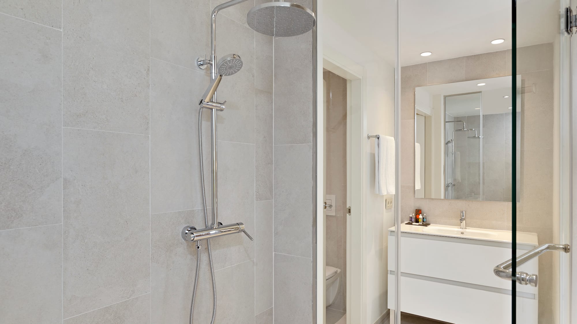a shower head in a bathroom