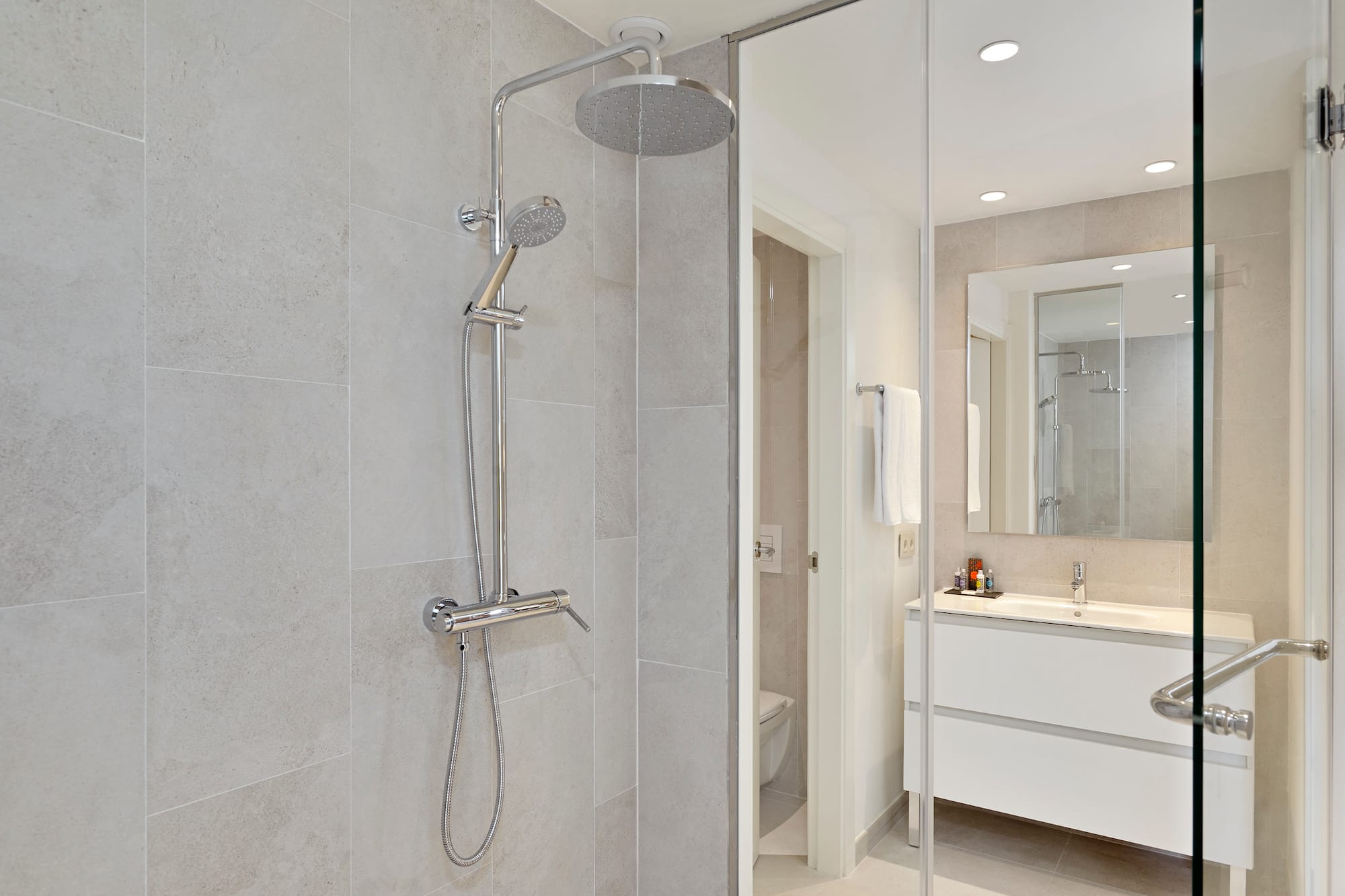 a shower head in a bathroom