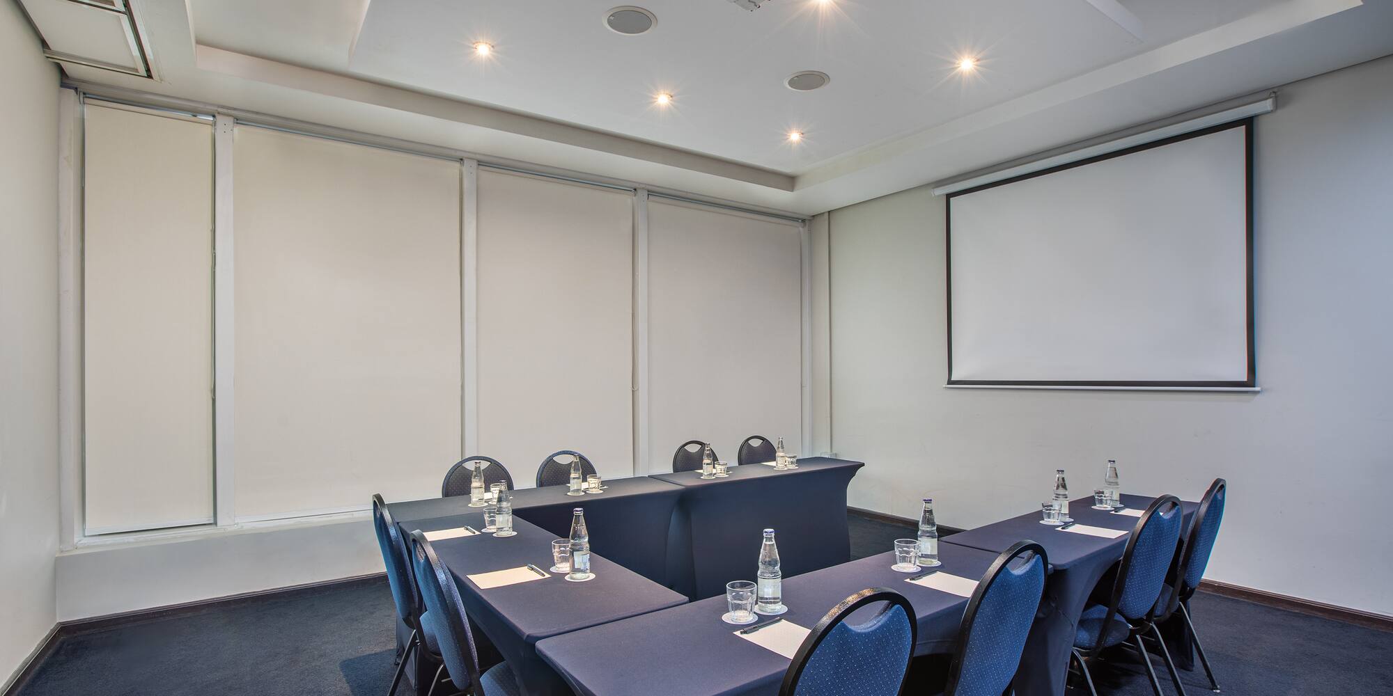 a room with tables and chairs