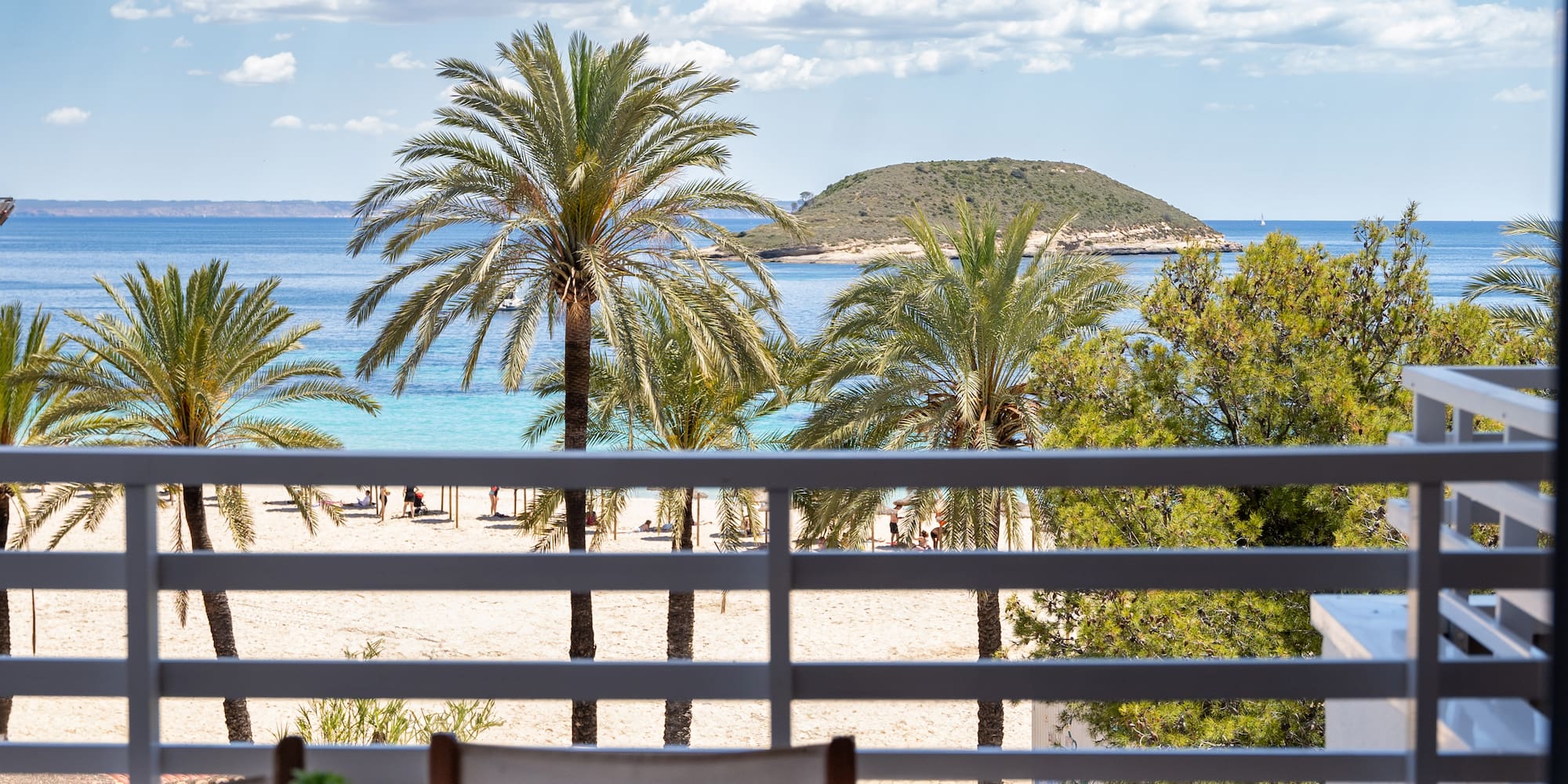 a view of a beach from a balcony