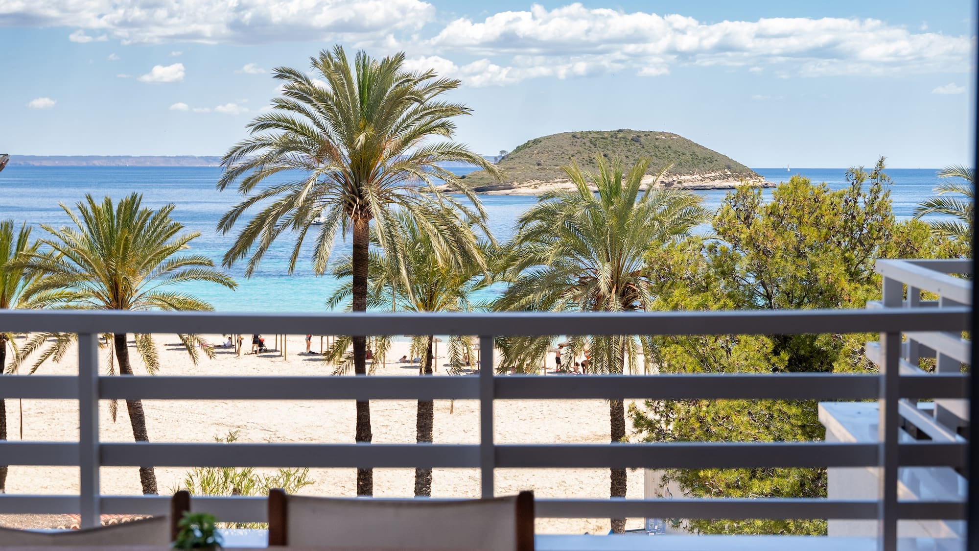 a view of a beach from a balcony