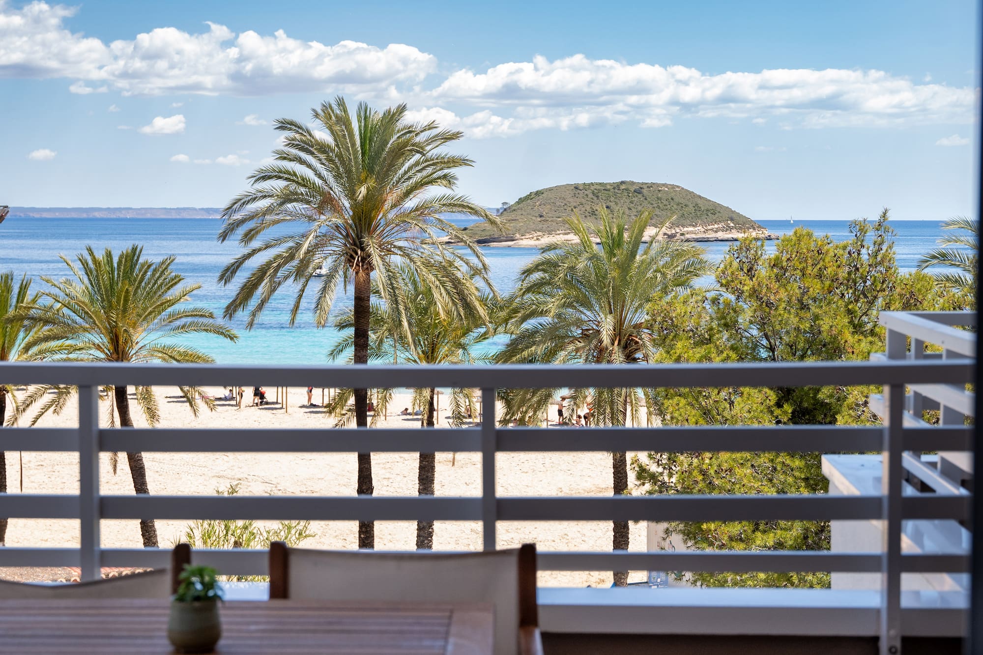 a view of a beach from a balcony