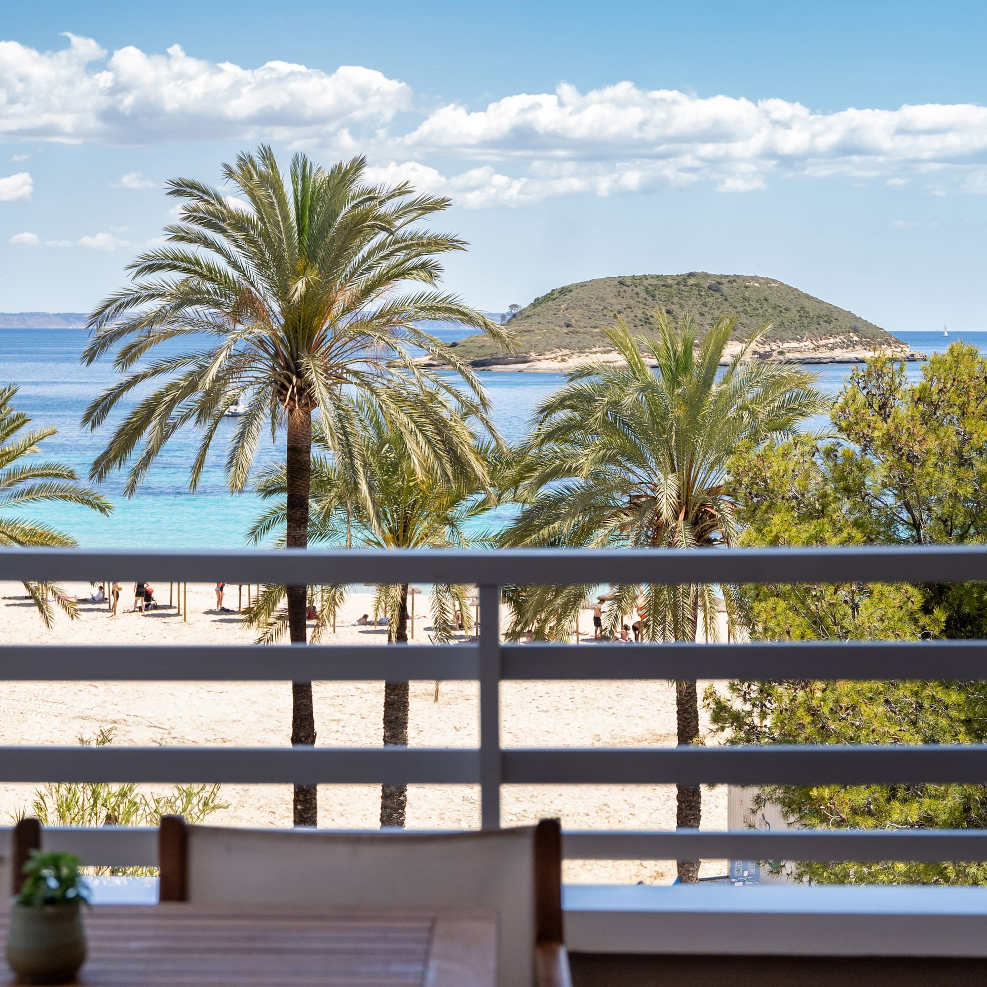 a view of a beach from a balcony