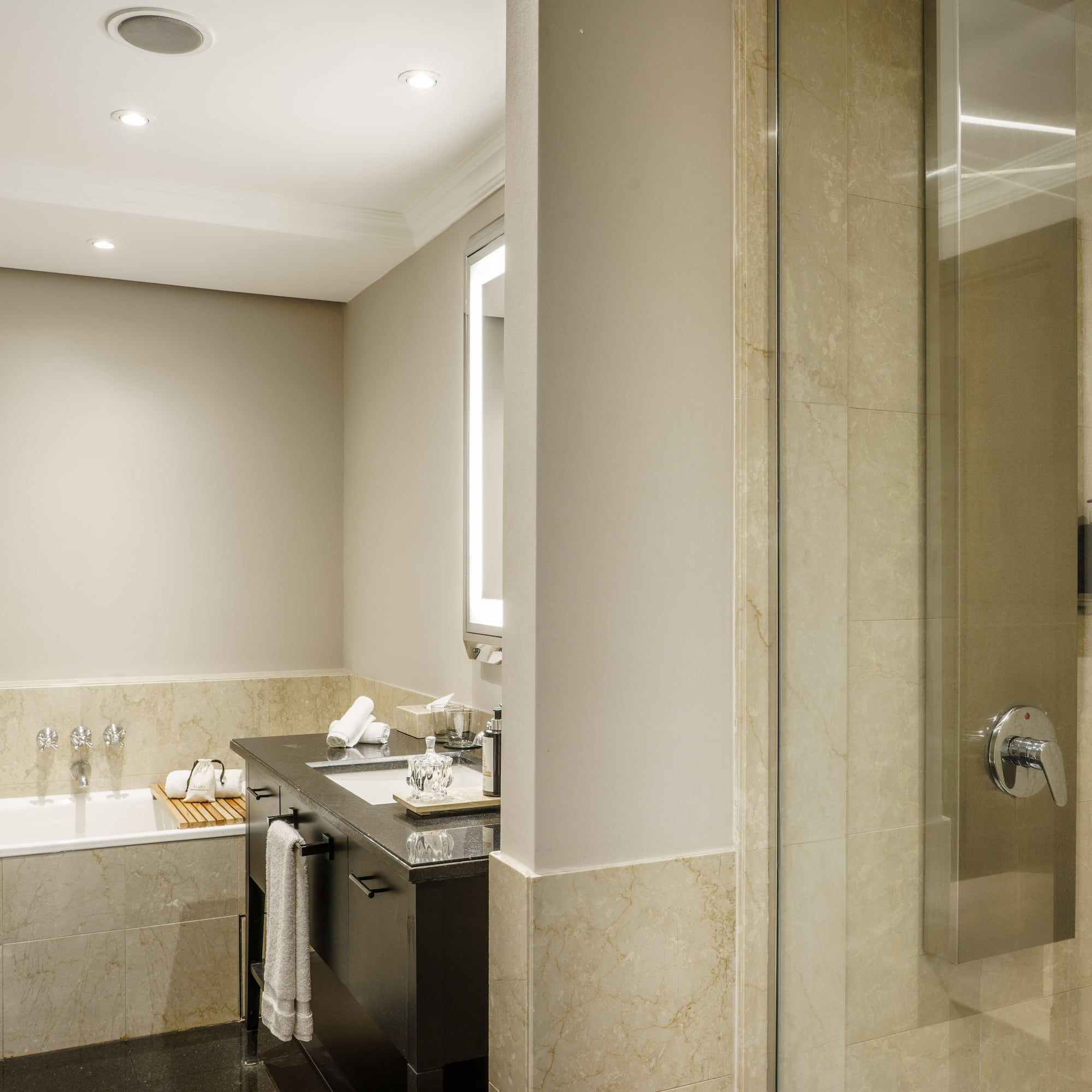 a bathroom with a shower and sink