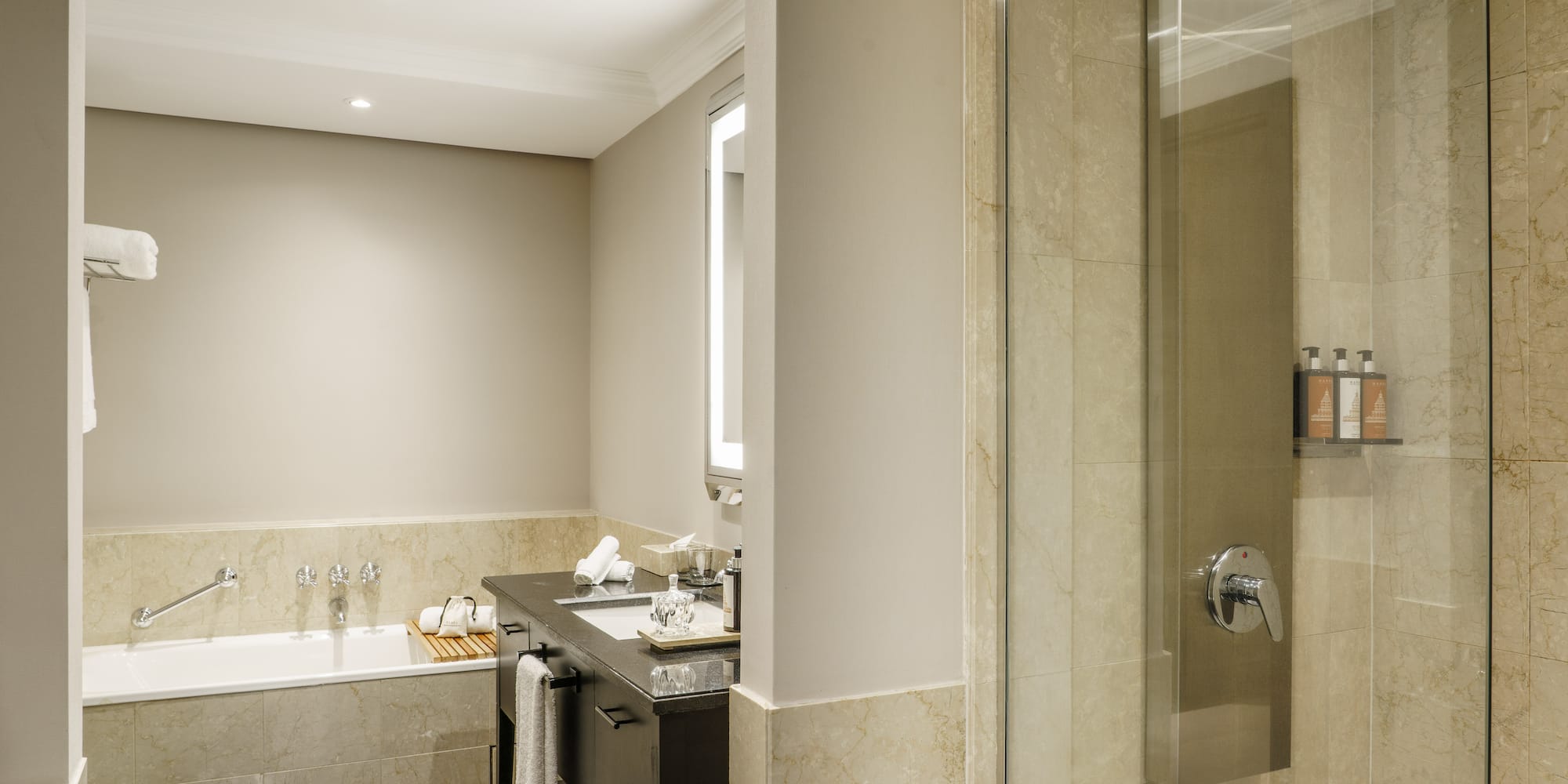 a bathroom with a shower and sink