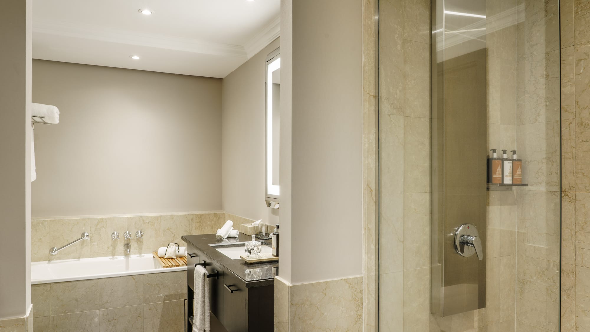 a bathroom with a shower and sink