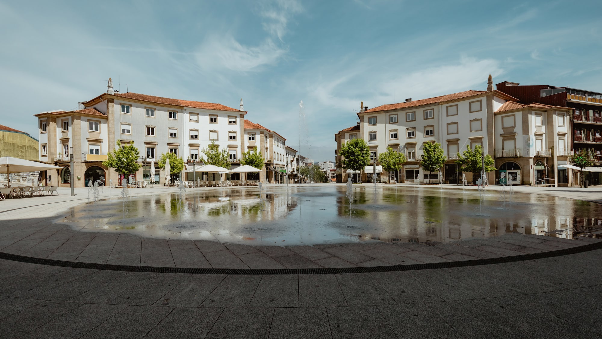 a water fountain in a city
