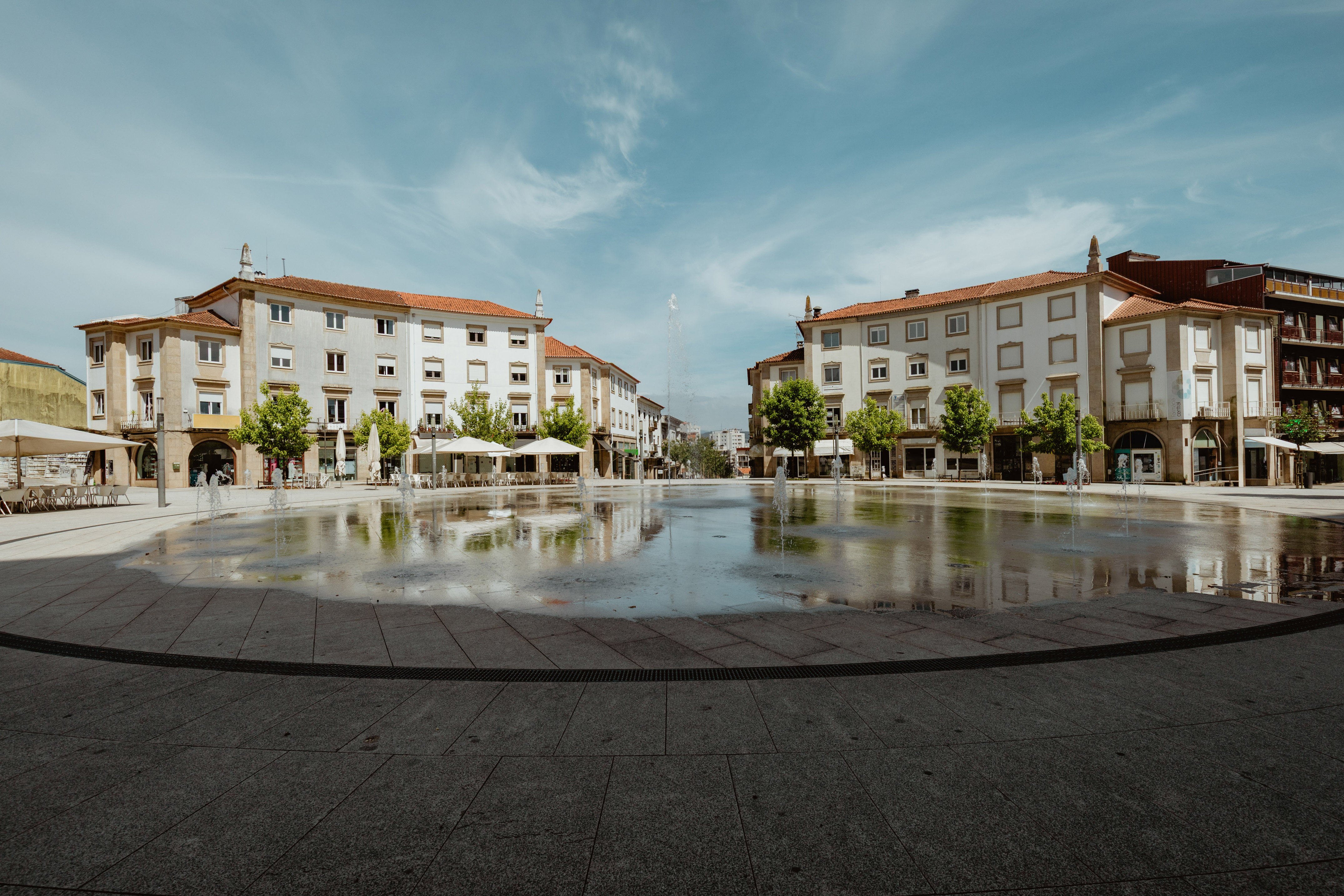 a water fountain in a city