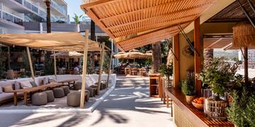 a restaurant with a table and chairs
